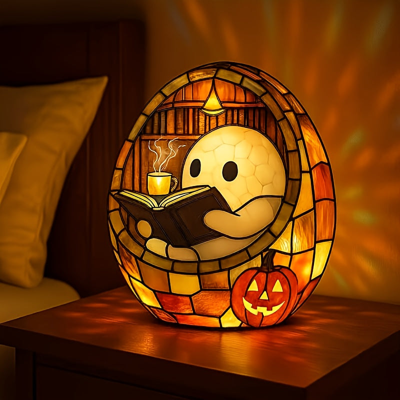 Lighted Halloween ghost figurine reading a book