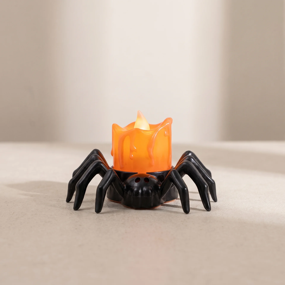Halloween LED candle on a black spider holder