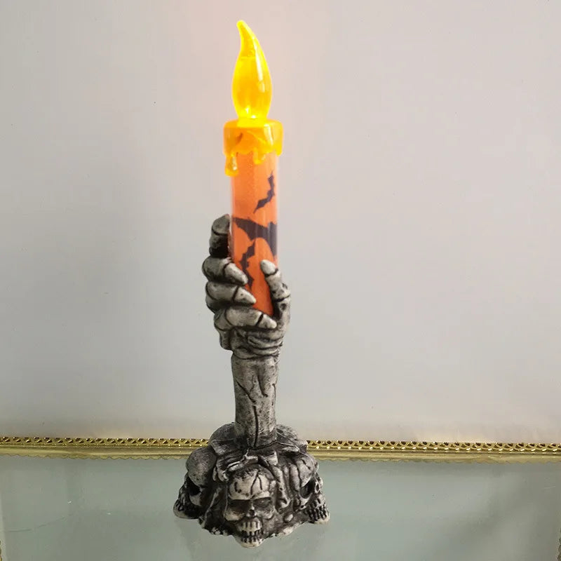 Halloween LED candles with skeleton-hand skull base