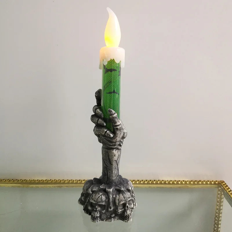 Halloween LED candles with skeleton-hand skull base
