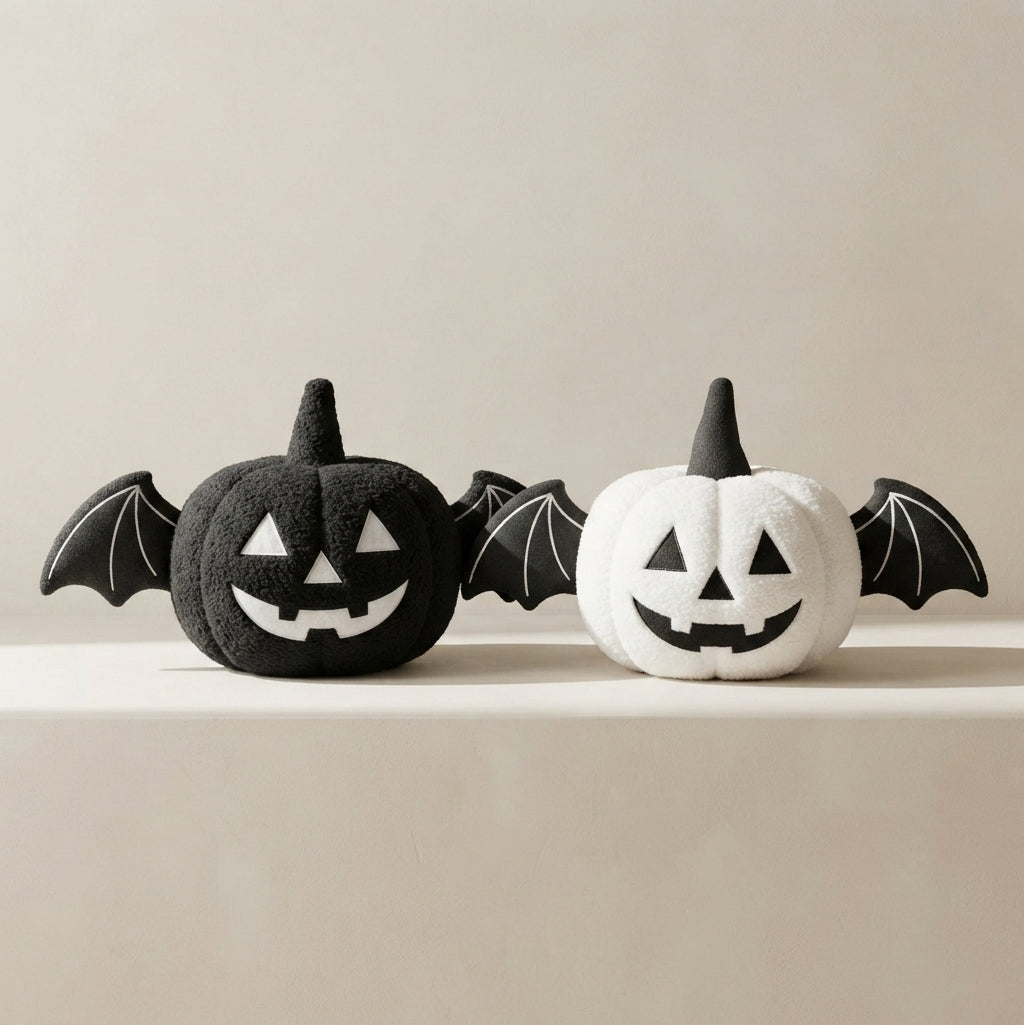 Halloween pumpkin cushion with bat wings