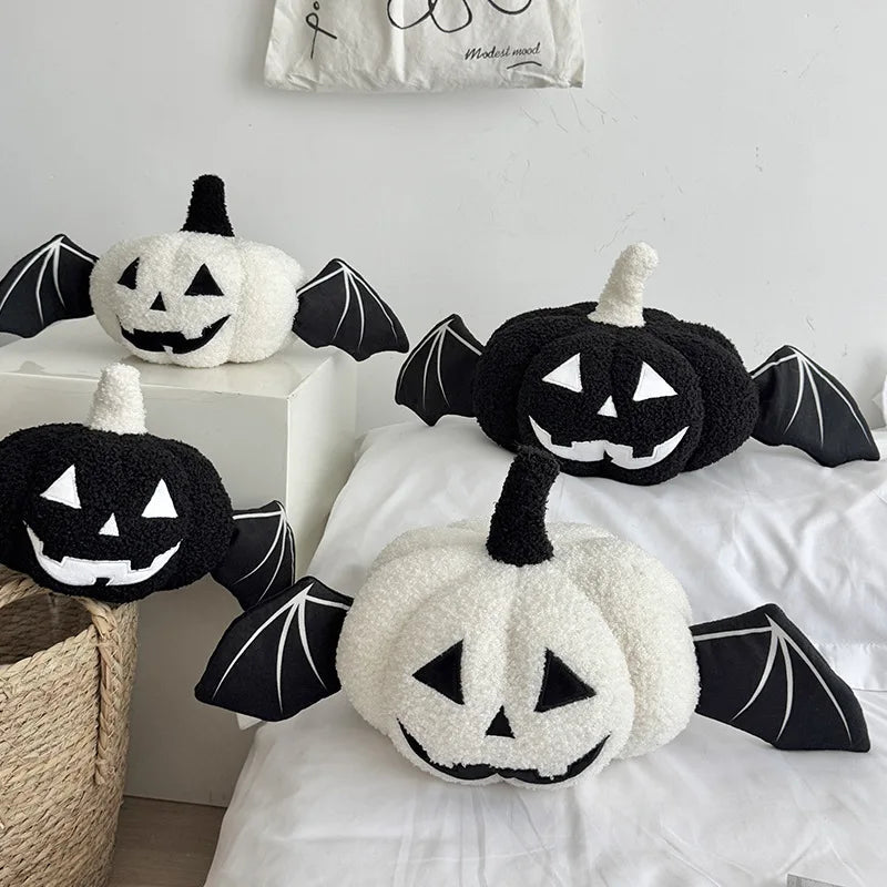 Halloween pumpkin cushion with bat wings