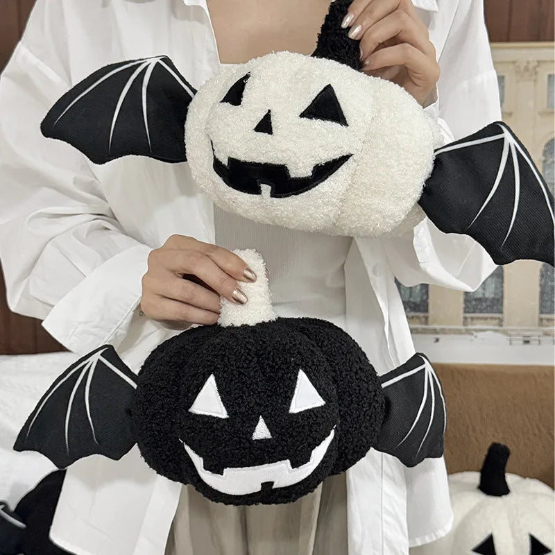 Halloween pumpkin cushion with bat wings