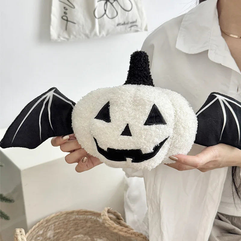 Halloween pumpkin cushion with bat wings