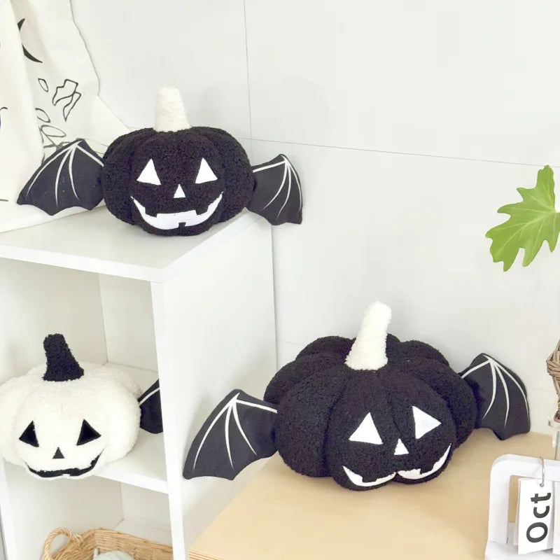 Halloween pumpkin cushion with bat wings