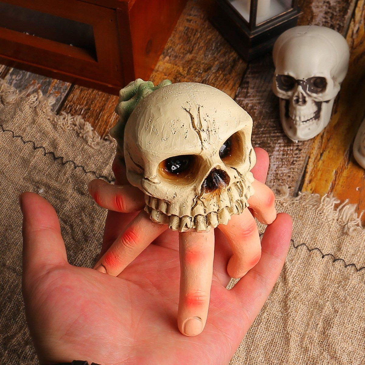 Halloween skull and skeleton hand ornament