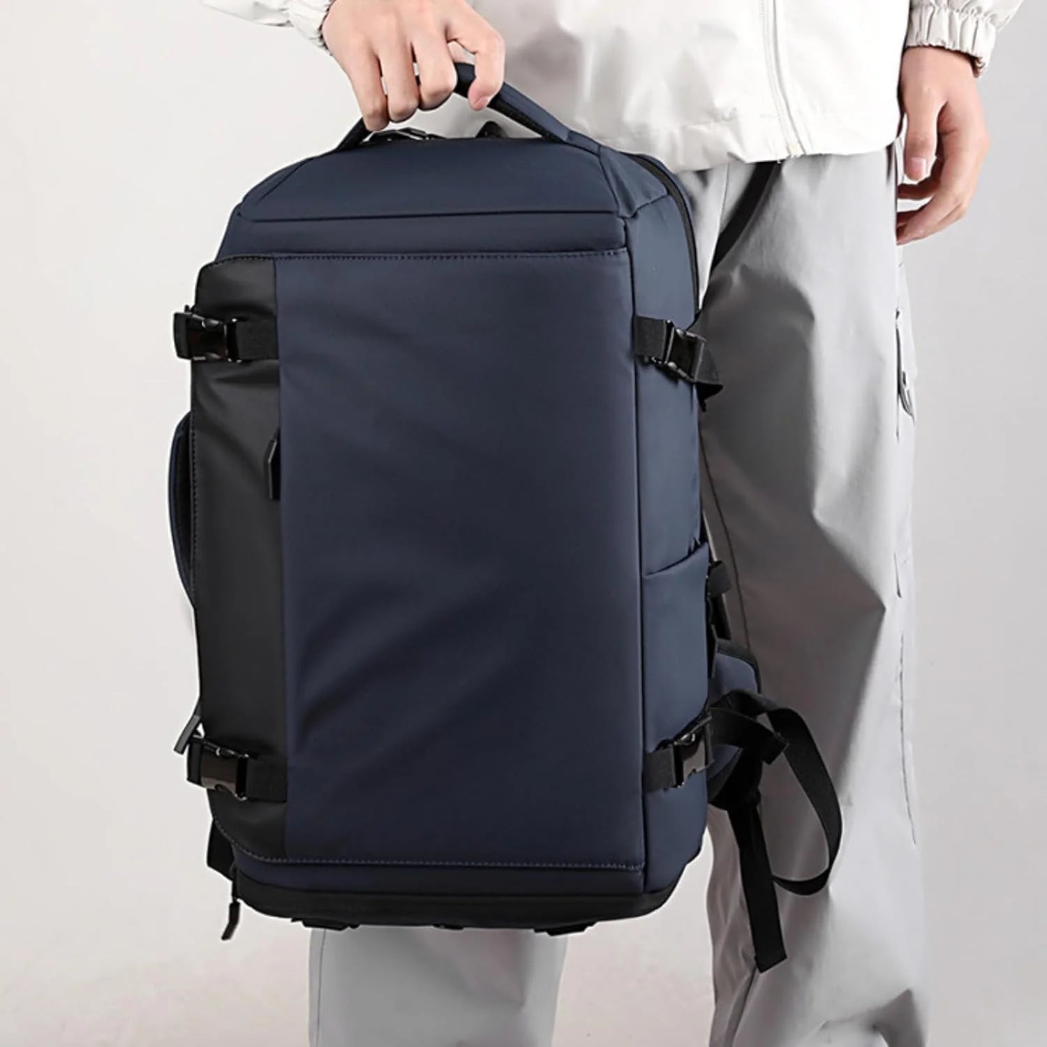 Water-resistant 15-inch laptop backpack with USB-C port and side access