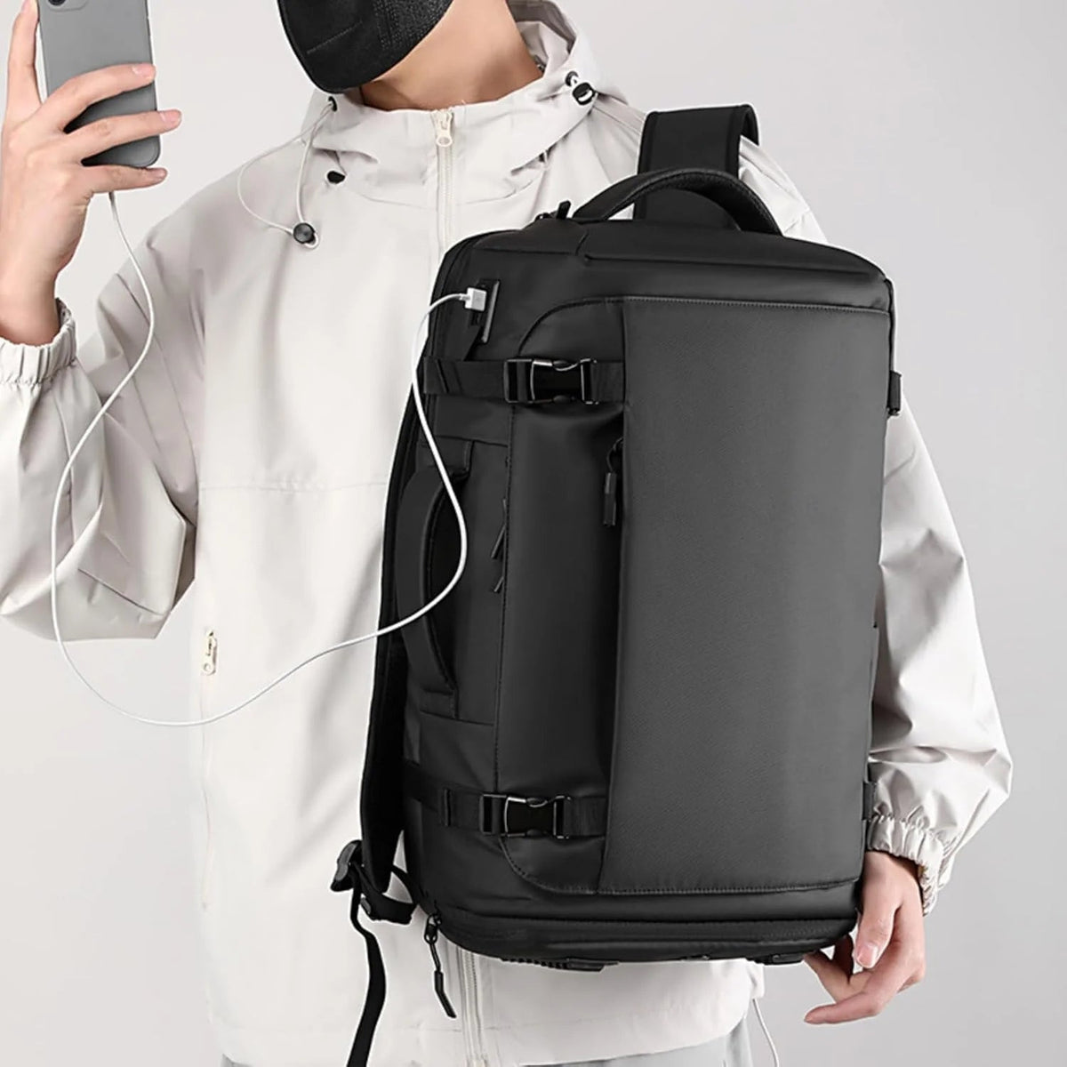 Water-resistant 15-inch laptop backpack with USB-C port and side access