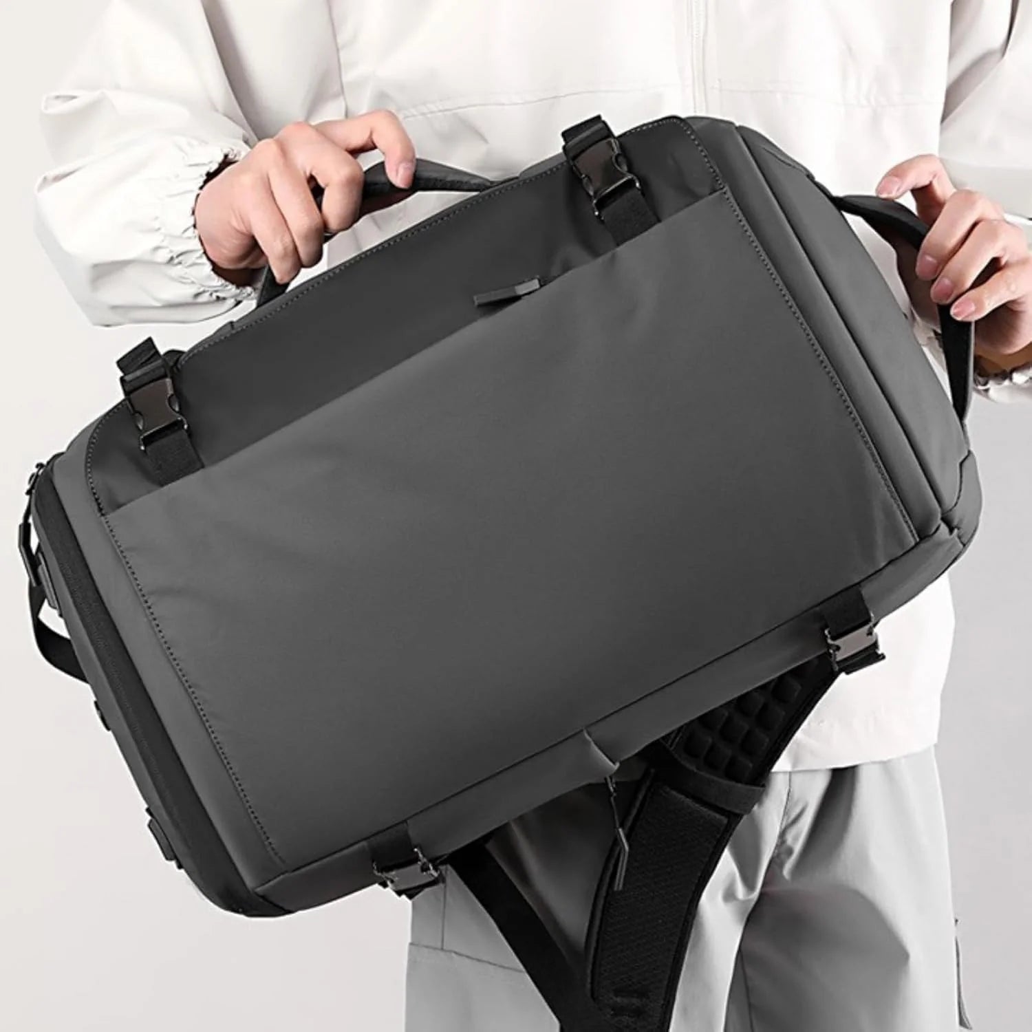 Water-resistant 15-inch laptop backpack with USB-C port and side access