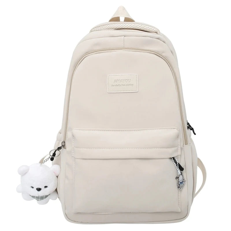 Water-resistant school backpack with multiple compartments for books and laptop