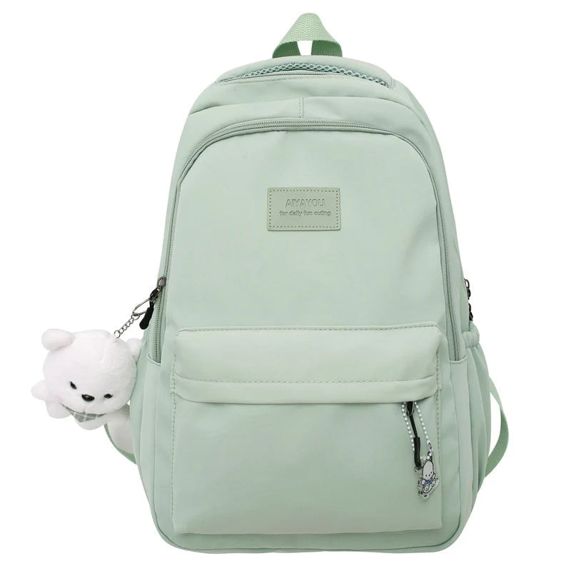 Water-resistant school backpack with multiple compartments for books and laptop