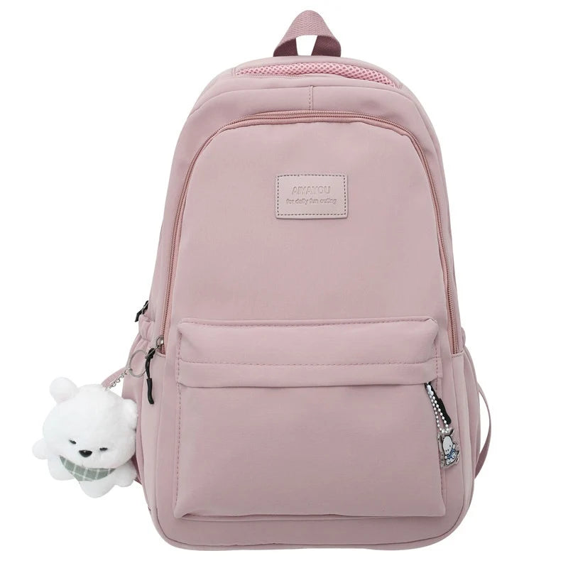 Water-resistant school backpack with multiple compartments for books and laptop