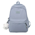 Water-resistant school backpack with multiple compartments for books and laptop