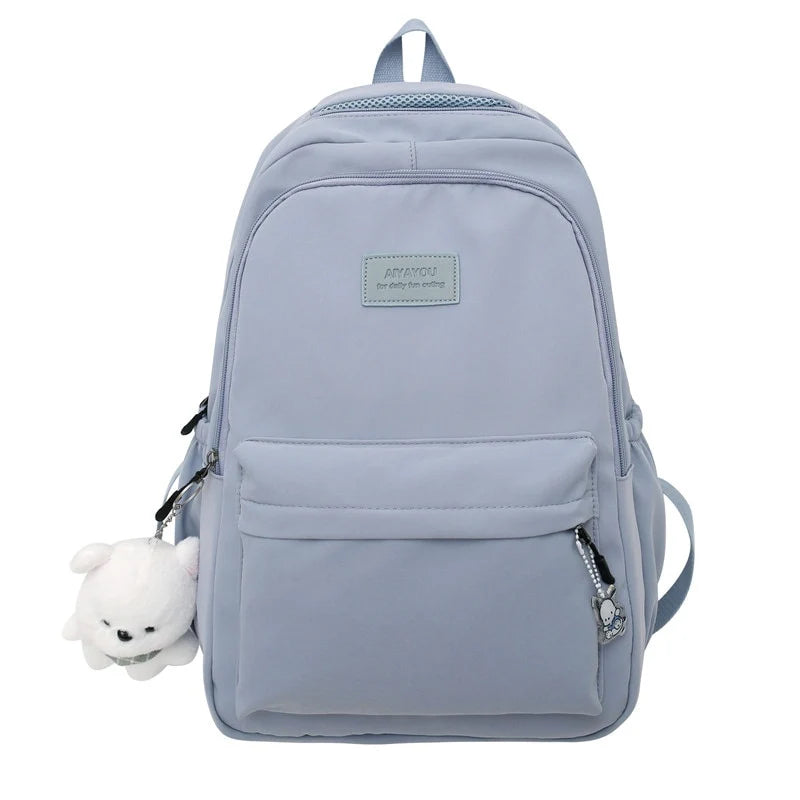 Water-resistant school backpack with multiple compartments for books and laptop