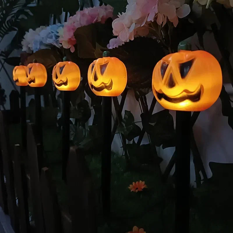 Solar Halloween pumpkin stake lights for gardens
