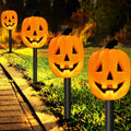 Solar Halloween pumpkin stake lights for gardens