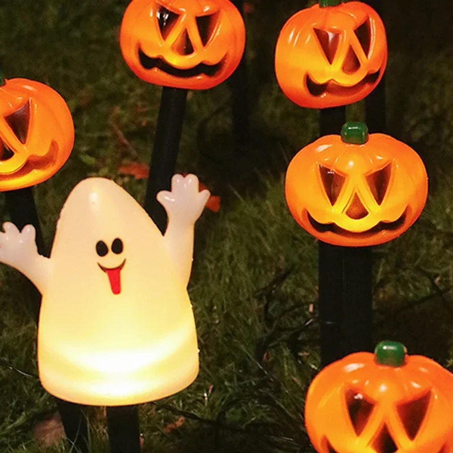 Solar Halloween pumpkin stake lights for gardens